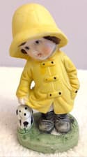 Vintagefigurine Child In Yellow Rain Coat